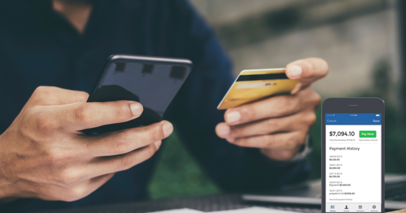 Person holding phone and credit card with Bill4Time online payments feature screen