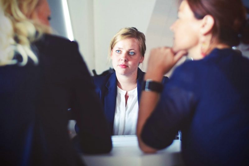 family law bill4time feature image. Woman with lawyers.