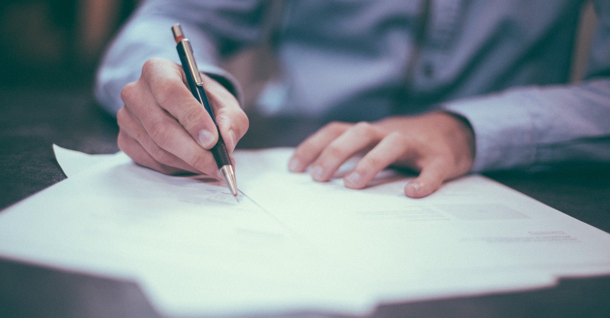 state bar association resources feature image blog post. Man writing with fancy pen.