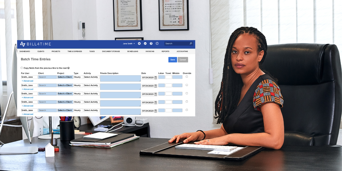 Woman attorney looking at a computer screen looking at Bill4Tme's legal billing software