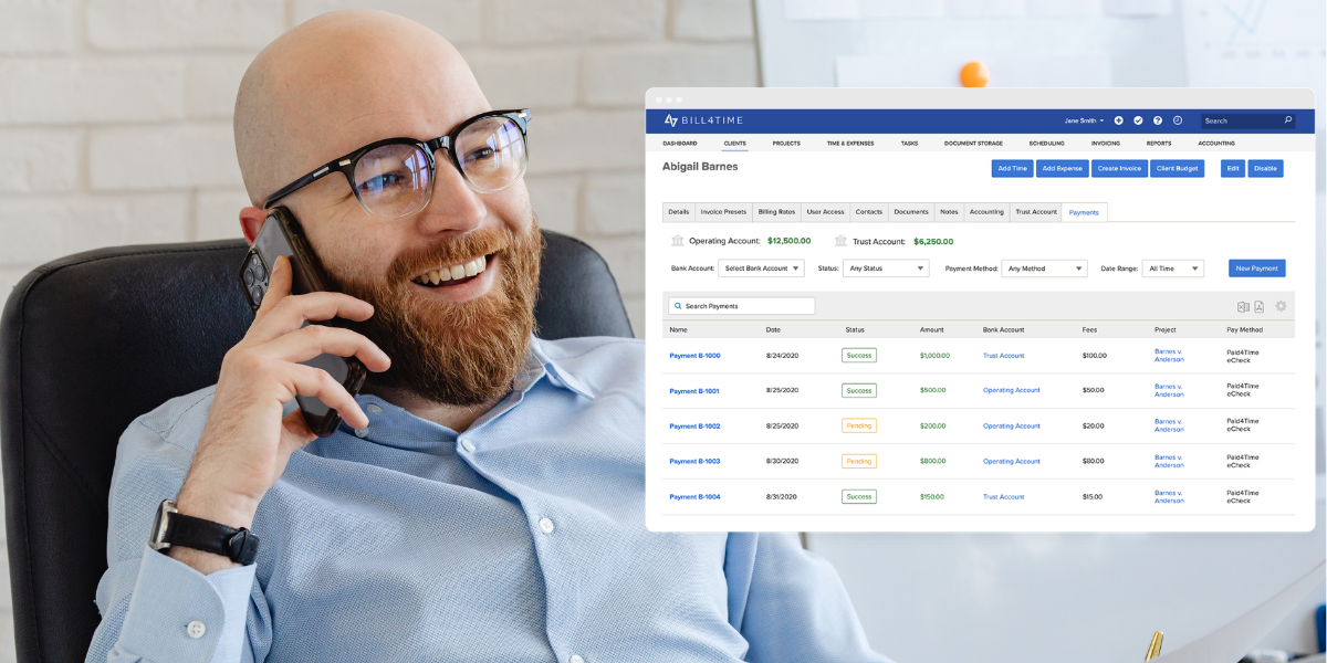A male lawyer reviewing billing information in Bill4Time's platform while on the phone with a client
