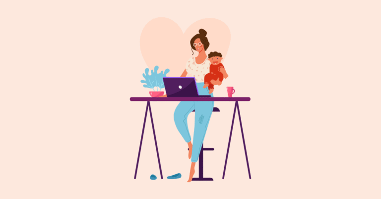 A woman working on her laptop while holding a baby